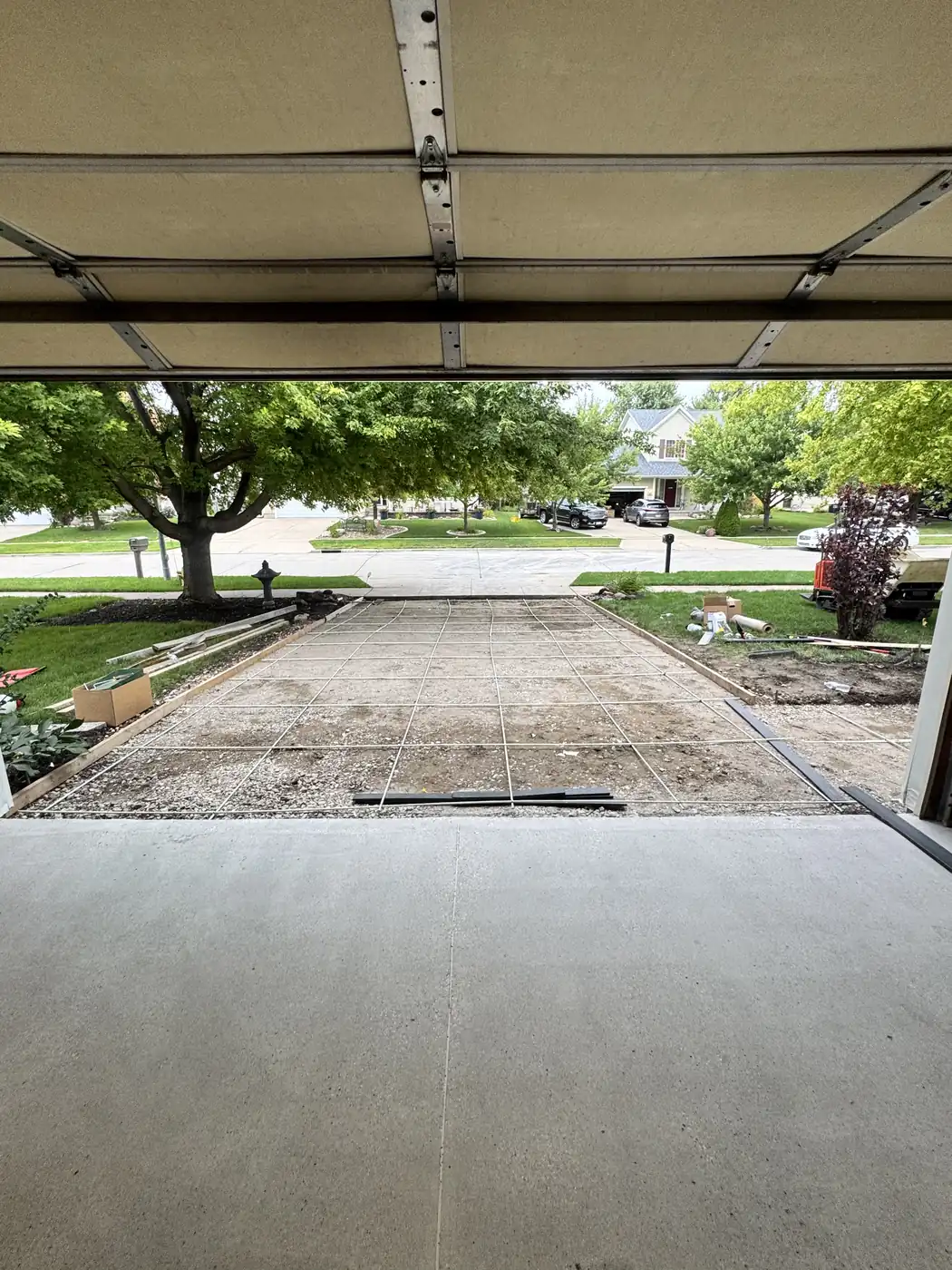 Reinforcing wire mesh laid over a compacted base in Waukee, Iowa, ready for the pour.
